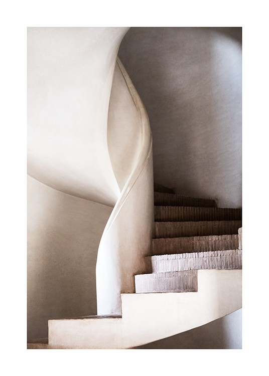  - Fotografia bieleho točitého schodiska s tehlovými schodmi